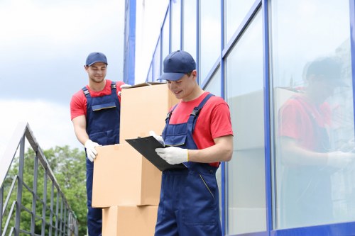 Professional movers assisting with office relocation in Storage Chelsea